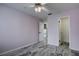Bedroom with ceiling fan and tile flooring at 7499 Heather Walk, Weeki Wachee, FL 34613