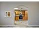 Open kitchen with wood cabinets, granite counters, and stainless steel appliances at 7499 Heather Walk, Weeki Wachee, FL 34613