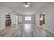 Bright and airy living room with tile flooring and high ceilings at 7499 Heather Walk, Weeki Wachee, FL 34613