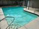Refreshing swimming pool with concrete deck and steps at 8353 Forest Oaks Blvd, Spring Hill, FL 34606