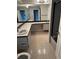Bathroom with double vanity and shower at 8353 Forest Oaks Blvd, Spring Hill, FL 34606