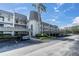 Condo building with parking and landscaping at 8765 Bardmoor Blvd # 208, Seminole, FL 33777