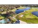 Golf course community with scenic waterways and lush landscaping at 10441 Garda Dr, Trinity, FL 34655