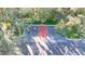 Aerial shot of a well-maintained basketball court, perfect for recreation and exercise at 10441 Garda Dr, Trinity, FL 34655