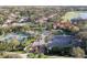 Community overview showing homes, tennis courts, and a clubhouse at 10441 Garda Dr, Trinity, FL 34655