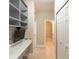 Hallway with a built-in desk area at 10441 Garda Dr, Trinity, FL 34655
