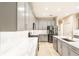 Stylish kitchen with stainless steel appliances and ample countertop space at 10441 Garda Dr, Trinity, FL 34655
