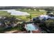 Luxury community boasts resort-style pool, clubhouse, golf course, and tennis courts at 10441 Garda Dr, Trinity, FL 34655