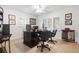 Bright home office features built-in shelving and wood flooring at 203 S Spring Blvd, Tarpon Springs, FL 34689