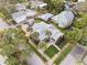 Home's bird's-eye view showcasing landscaping and driveway at 203 S Spring Blvd, Tarpon Springs, FL 34689