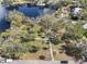 Aerial view showing a park with mature trees and walkways at 203 S Spring Blvd, Tarpon Springs, FL 34689