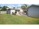 Spacious backyard with grassy area and shed at 203 S Spring Blvd, Tarpon Springs, FL 34689
