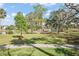 Park with lush trees and a scenic waterfront view at 203 S Spring Blvd, Tarpon Springs, FL 34689