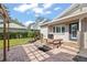 Backyard patio features pergola and brick pavers at 203 S Spring Blvd, Tarpon Springs, FL 34689