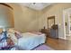 Bedroom with double bed, dresser, and hardwood floors at 2533 Wood Pointe Dr, Holiday, FL 34691