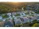 Aerial view of houses on a tree-lined street at 2533 Wood Pointe Dr, Holiday, FL 34691