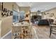 Bright kitchen with a casual dining area and views to the Gathering room at 2533 Wood Pointe Dr, Holiday, FL 34691