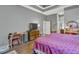 Main bedroom with hardwood floors and ample closet space at 2533 Wood Pointe Dr, Holiday, FL 34691