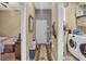 Bright hallway with access to bedrooms and laundry room at 2533 Wood Pointe Dr, Holiday, FL 34691