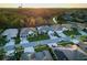 Aerial view of houses on a tree-lined street at 2533 Wood Pointe Dr, Holiday, FL 34691