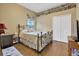 Bedroom with an ornate bed frame and a closet at 2533 Wood Pointe Dr, Holiday, FL 34691