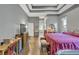 Spacious main bedroom with hardwood floors and ensuite bathroom at 2533 Wood Pointe Dr, Holiday, FL 34691