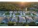 Aerial view of houses on a tree-lined street at 2533 Wood Pointe Dr, Holiday, FL 34691