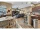 Open concept kitchen with a breakfast bar and Gathering room views at 2533 Wood Pointe Dr, Holiday, FL 34691