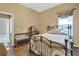 Bedroom with a metal bed frame and wood flooring at 2533 Wood Pointe Dr, Holiday, FL 34691