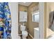 Small bathroom with toilet and sink at 2533 Wood Pointe Dr, Holiday, FL 34691