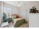 Comfortable bedroom with a queen-size bed and ample closet space at 3527 Conifer Loop, Spring Hill, FL 34609