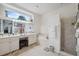 Elegant bathroom with double vanity, soaking tub, and separate shower at 3527 Conifer Loop, Spring Hill, FL 34609