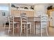 Large kitchen island with seating for four at 3527 Conifer Loop, Spring Hill, FL 34609