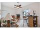 Relaxing bonus room features a wet bar, seating area, and sliding glass doors leading to the backyard at 3527 Conifer Loop, Spring Hill, FL 34609