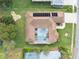 Home with solar panels, pool, and screened enclosure at 3527 Conifer Loop, Spring Hill, FL 34609