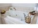 Oval soaking tub with candles and towels at 3527 Conifer Loop, Spring Hill, FL 34609