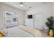 Comfortable bedroom with backyard view and dresser at 3527 Conifer Loop, Spring Hill, FL 34609