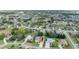Aerial view showcasing a large neighborhood with houses and green spaces at 3527 Conifer Loop, Spring Hill, FL 34609