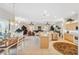 Open kitchen with large island and views into the dining and living areas at 3527 Conifer Loop, Spring Hill, FL 34609