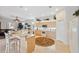 Well-equipped kitchen with an island and views of the living room at 3527 Conifer Loop, Spring Hill, FL 34609