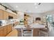 Bright and spacious kitchen with breakfast bar and stainless steel appliances at 3527 Conifer Loop, Spring Hill, FL 34609
