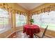 Bright breakfast nook with window seating at 414 Bloomfield Dr, Spring Hill, FL 34609