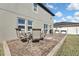 Backyard patio with seating area, perfect for outdoor dining at 4166 Sand Ridge Blvd, Spring Hill, FL 34609