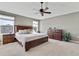 Spacious main bedroom with king-size bed and ample natural light at 4166 Sand Ridge Blvd, Spring Hill, FL 34609