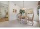 Charming dining area with a round table and four chairs at 4222 Northampton Dr, New Port Richey, FL 34653