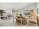 Spacious living room with ample natural light and comfortable seating at 4222 Northampton Dr, New Port Richey, FL 34653