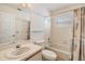 Bathroom with bathtub, toilet, and vanity with a sink at 4222 Northampton Dr, New Port Richey, FL 34653