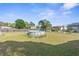 Backyard with above ground pool and large yard at 6060 Silverdale Ave, Spring Hill, FL 34608