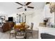 Dining area with table and chairs, open to living room at 6060 Silverdale Ave, Spring Hill, FL 34608