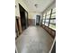 Under renovation sunroom with new flooring at 6176 Island Dr, Weeki Wachee, FL 34607